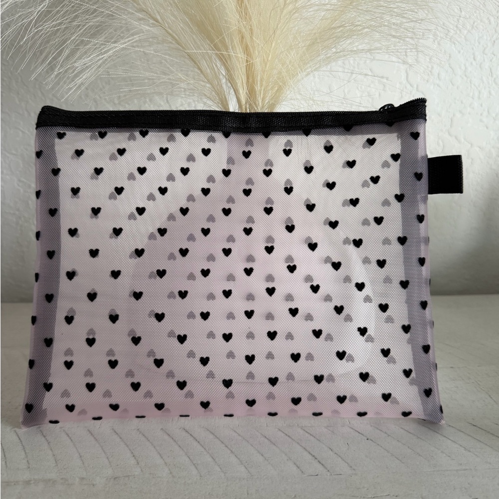 Pink zip mesh cosmetic case